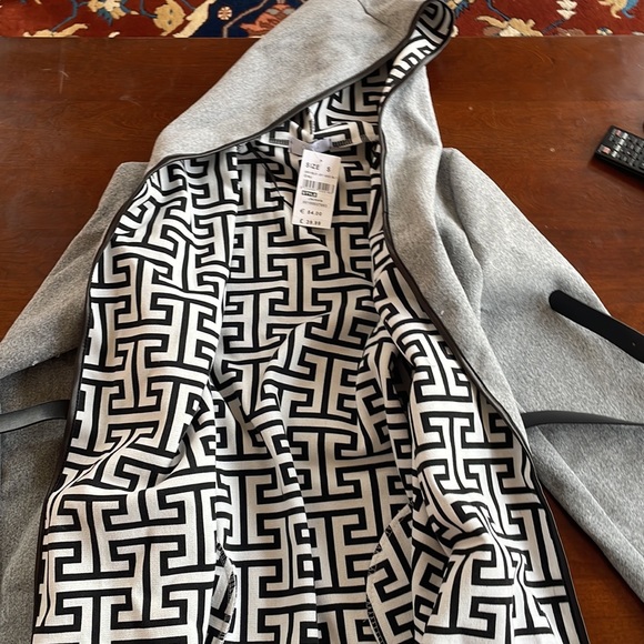 grey coat with black and white patterned inside - Picture 2 of 2
